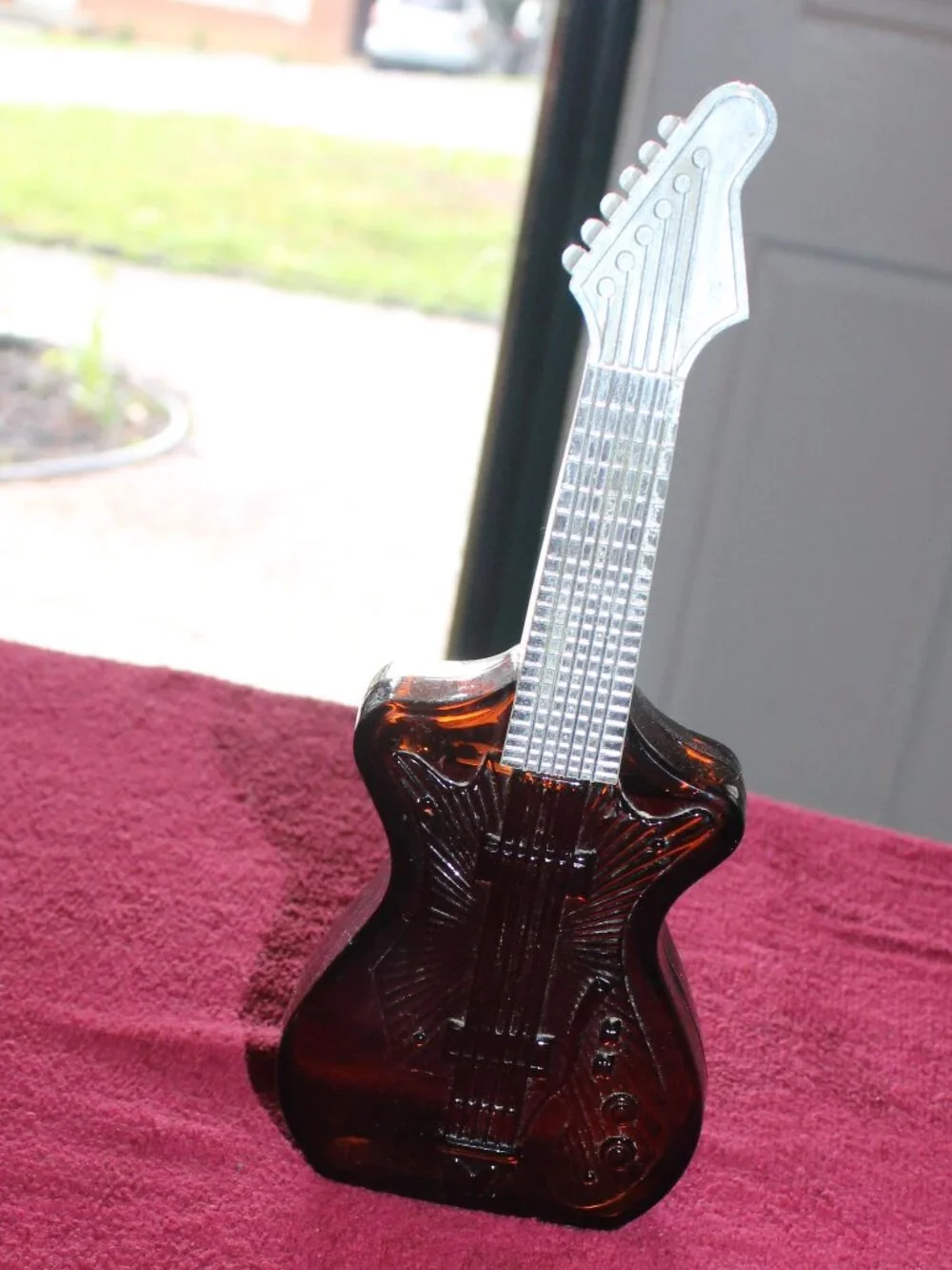 Vintage Avon electric guitar-shaped decanter